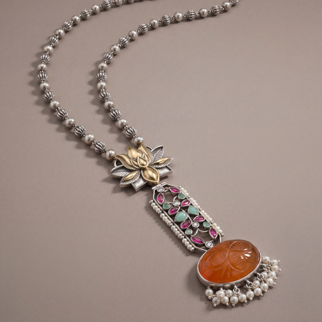 Statement Piece — Carved Orange Stone Long Pendant in Oxidised Silver