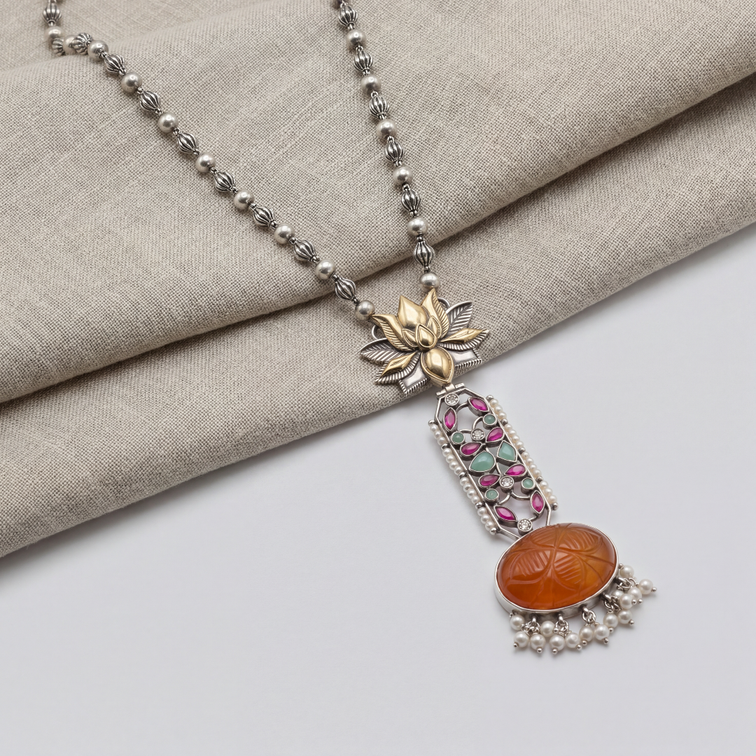 Statement Piece — Carved Orange Stone Long Pendant in Oxidised Silver